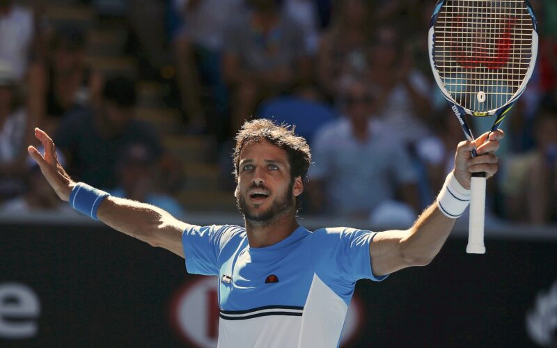 Lopez of Spain celebrates defeating Janowicz of Poland in their men's singles match at the Australian Open 2015 tennis tournament in Melbourne