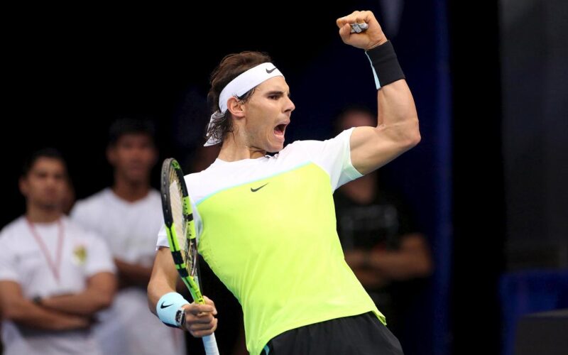 Micromax Indian Aces player Rafael Nadal of Spain reacts during a match against Manila Mavericks player Milos Raonic of Canada in their men's singles in Pasay