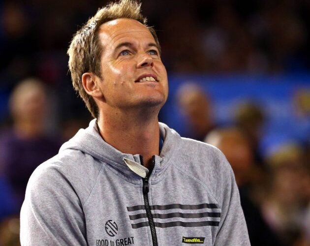 Magnus Norman coach of Stanislas Wawrinka of Switzerland smiles at The Australian Open 2014 BPI_E