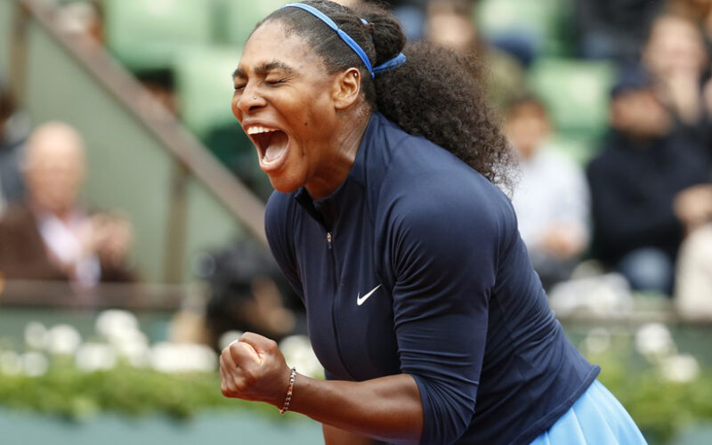 Serena Williams of the U.S. clenches her fist after scoring a point in the semifinal match of the French Open tennis tournament against Netherlands' Kiki Bertens at the Roland Garros stadium in Paris, France, Friday, June 3, 2016. (AP Photo/Alastair Grant)