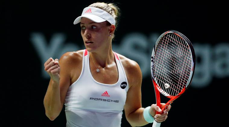 Tennis - Singapore WTA Finals Singles - National Indoor Stadium, Singapore - 23/10/16 - Angelique Kerber of Germany celebrates winning a tie break against Dominika Cibulkova of Slovakia. REUTERS/Edgar Su