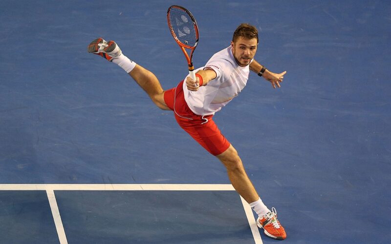 MELBOURNE, AUSTRALIA - JANUARY 26:  Stanislas Wawrinka of Switzerland plays a backhand in his men's final match against Rafael Nadal of Spain during day 14 of the 2014 Australian Open at Melbourne Park on January 26, 2014 in Melbourne, Australia.  (Photo by Michael Dodge/Getty Images)