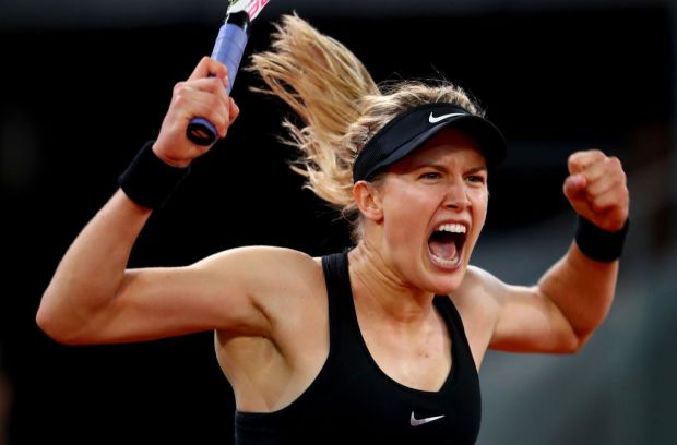 MADRID, SPAIN - MAY 08:  Eugenie Bouchard of Canada celebrates match point in her match against Maria Sharapova of Russia on day three of the Mutua Madrid Open tennis at La Caja Magica on May 8, 2017 in Madrid, Spain.  (Photo by Clive Rose/Getty Images)
