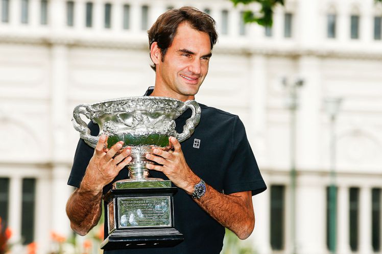 MELBOURNE, AUSTRALIA - JANUARY 30:  Roger Federer of Switzerland poses with the Norman Brookes Challenge Cup after winning the 2017 Australian Open Men's Singles Final, on January 30, 2017 in Melbourne, Australia.  (Photo by Daniel Pockett/Getty Images)