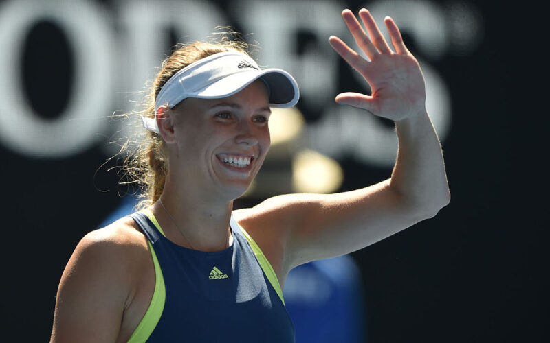 Denmark's Caroline Wozniacki celebrates beating Belgium's Elise Mertens in their women's singles semi-finals match on day 11 of the Australian Open tennis tournament in Melbourne on January 25, 2018. / AFP PHOTO / PETER PARKS / -- IMAGE RESTRICTED TO EDITORIAL USE - STRICTLY NO COMMERCIAL USE --        (Photo credit should read PETER PARKS/AFP/Getty Images)