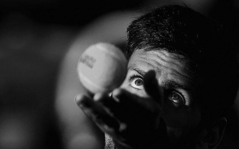 KEY BISCAYNE, FL - MARCH 22:  (Editors Note:  This digital image has been converted to Black and White)  Novak Djokovic of Serbia serves during his first round doubles match during the Miami Open Presented by Itau at Crandon Park Tennis Center on March 22, 2018 in Key Biscayne, Florida.  (Photo by Clive Brunskill/Getty Images)