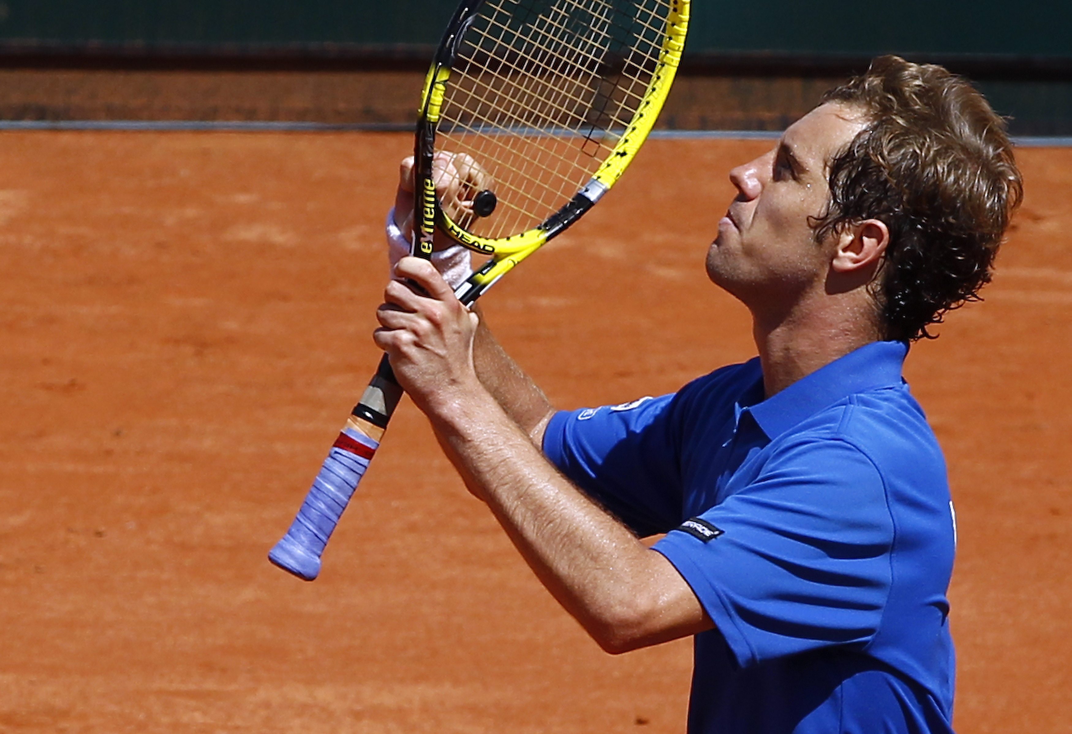 Gasquet from France reacts during the men's first single Davis Cup tennis quarter-final match in Stuttgart