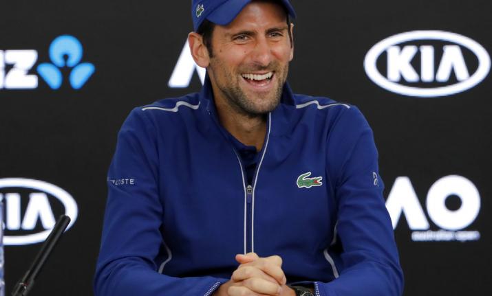 novak-djokovic-smiles-during-a-press-conference-at-the-australian-open-ap-1521638728