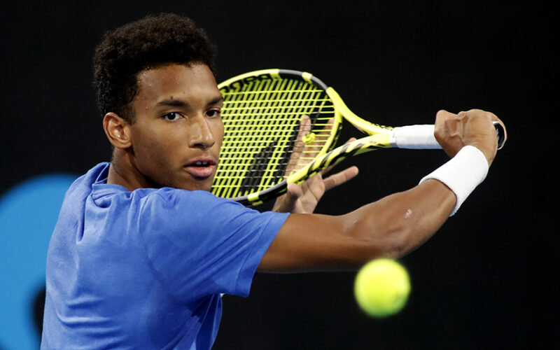 Felix Auger-Aliassime of Canada plays a shot against Alex Bolt of Australia during the Quarter Finals on day 5 of the Adelaide International tennis tournament atMemorial Drive Tennis Centre inAdelaide, Thursday, January 16, 2020. (AAP Image/Kelly Barnes) NO ARCHIVING, EDITORIAL USE ONLY ** STRICTLY EDITORIAL USE ONLY, NO COMMERCIAL USE, NO BOOKS **