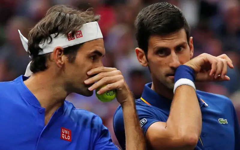 roger_federer_and_novak_djokovic_exchange_tactics_before_a_point-1040x5721
