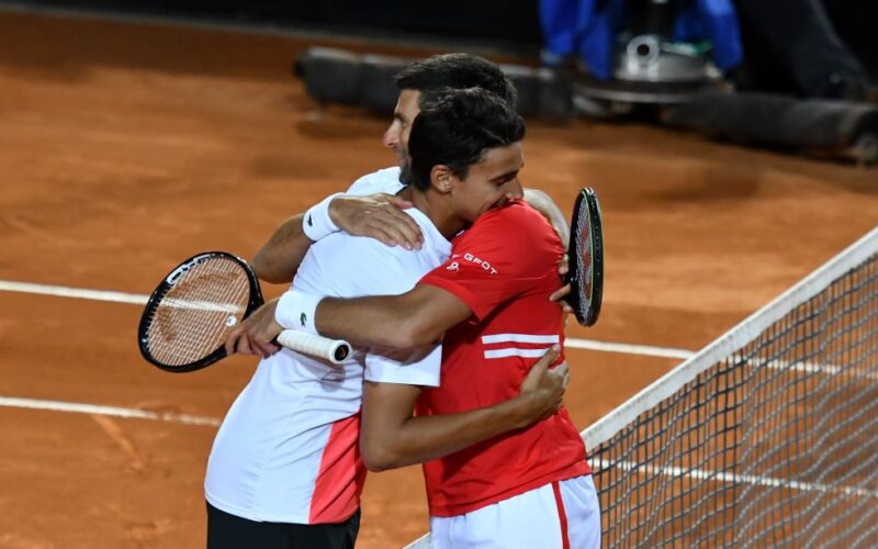 Lorenzo Sonego e Novak Djokovic