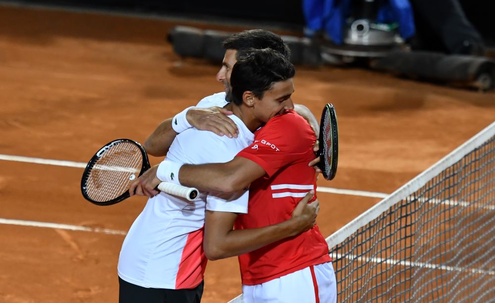 Lorenzo Sonego e Novak Djokovic