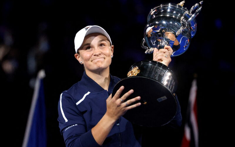 Tennis - Australian Open - Women's Singles Final - Melbourne Park, Melbourne, Australia - January 29, 2022 Australia's Ashleigh Barty poses as she celebrates winning the final against Danielle Collins of the U.S. with the trophy REUTERS/Asanka Brendon Ratnayake