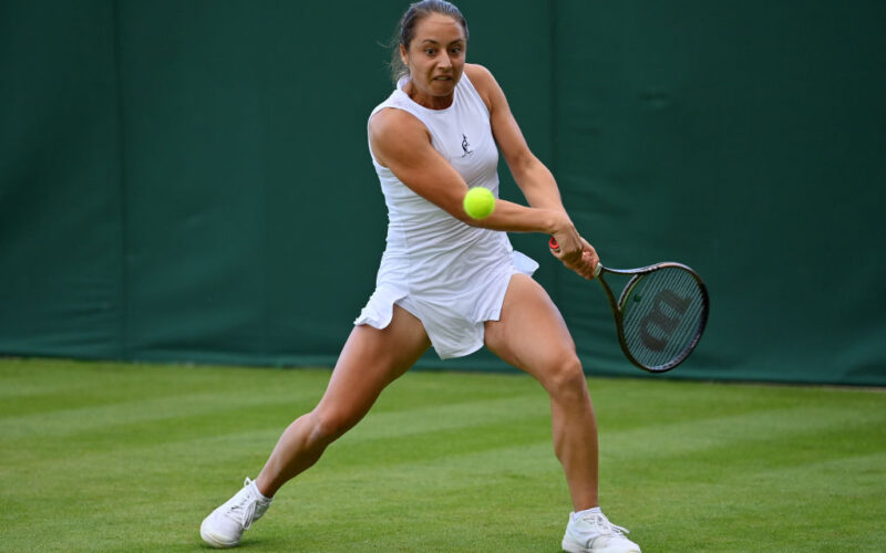 LONDON, ENGLAND - JUNE 27: Elisabetta Cocciaretto of Italy plays a backhand against Martina Trevisan of Italy during the Women's Singles First Round match during Day One of The Championships Wimbledon 2022 at All England Lawn Tennis and Croquet Club on June 27, 2022 in London, England. (Photo by Justin Setterfield/Getty Images)