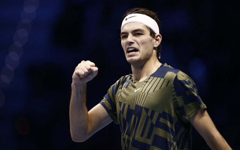 Tennis - ATP Finals Turin - Pala Alpitour, Turin, Italy - November 13, 2022 Taylor Fritz of the U.S. celebrates winning his first set during his group stage match against Spain's Rafael Nadal REUTERS/Guglielmo Mangiapane