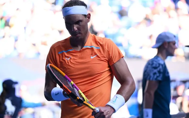 Spain's Rafael Nadal reacts as he plays against Britain's Jack Draper during their men's singles match on day one of the Australian Open tennis tournament in Melbourne on January 16, 2023. - -- IMAGE RESTRICTED TO EDITORIAL USE - STRICTLY NO COMMERCIAL USE -- (Photo by WILLIAM WEST / AFP) / -- IMAGE RESTRICTED TO EDITORIAL USE - STRICTLY NO COMMERCIAL USE -- (Photo by WILLIAM WEST/AFP via Getty Images)