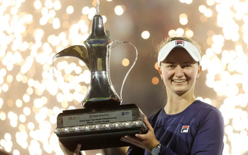 DUBAI, UNITED ARAB EMIRATES - FEBRUARY 25: Barbora Krejcikova of Czech Republic celebrates with the trophy after defeating Iga Swiatek of Poland during the Women's Singles Final match on day seven of the Dubai Duty Free Tennis at Dubai Duty Free Tennis Stadium on February 25, 2023 in Dubai, United Arab Emirates. (Photo by Christopher Pike/Getty Images)