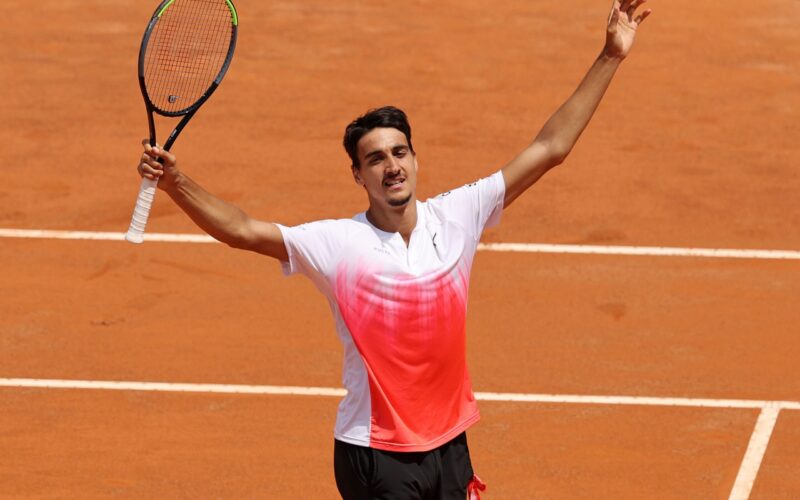 ROME, ITALY - MAY 15: Lorenzo Sonego of Italy celebrates winning match point during his Quarter Final match with Andrey Rublev of Russia on Day Eight of the Internazionali BNL D'Italia 2021 at Foro Italico on May 15, 2021 in Rome, Italy.  (Photo by Clive Brunskill/Getty Images)