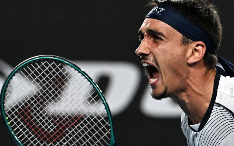 Italy's Lorenzo Sonego celebrates victory against Britain's Daniel Evans during their men's singles match on day three of the Australian Open tennis tournament in Melbourne on January 16, 2024. (Photo by Anthony WALLACE / AFP) / -- IMAGE RESTRICTED TO EDITORIAL USE - STRICTLY NO COMMERCIAL USE -- (Photo by ANTHONY WALLACE/AFP via Getty Images)