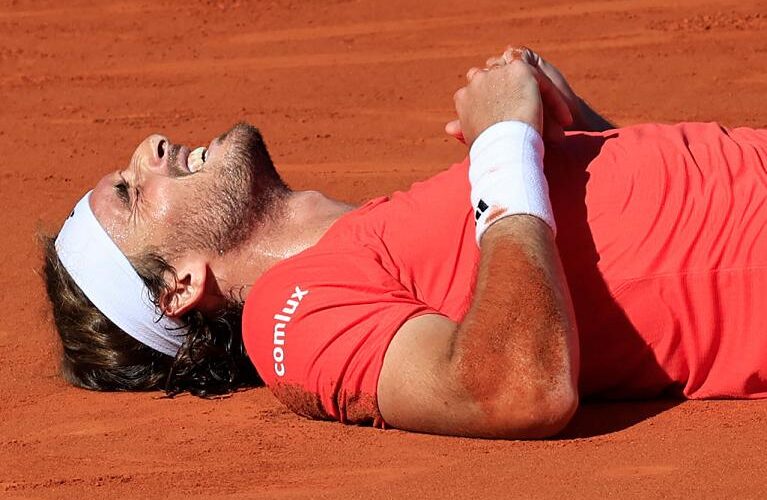 Greece's Stefanos Tsitsipas celebrates after winning at the end of his Monte Carlo ATP Masters Series Tournament final tennis match against Norway's Casper Ruud on the Rainier III court at the Monte Carlo Country Club on April 14, 2024. (Photo by Valery HACHE / AFP) (Photo by VALERY HACHE/AFP via Getty Images)