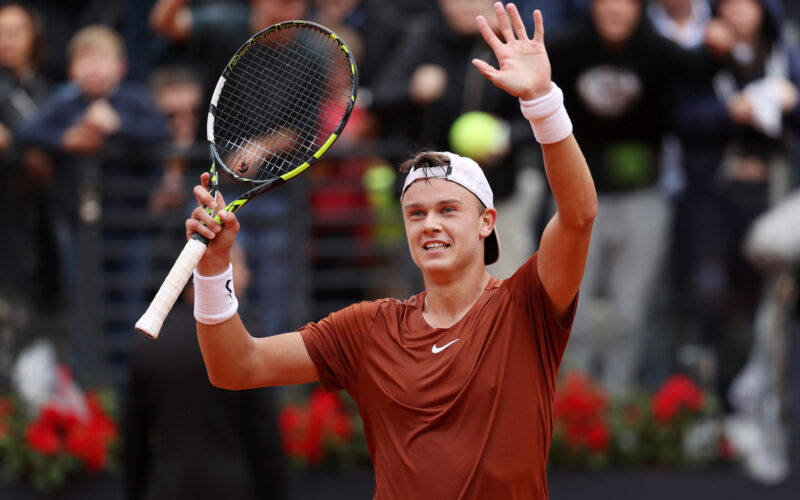 ROME, ITALY - MAY 17: Holger Rune of Denmark celebrates winning match point against Novak Djokovic of Serbia during their Men's Singles quarter-final match on day ten of Internazionali BNL D'Italia 2023 at Foro Italico on May 17, 2023 in Rome, Italy. (Photo by Alex Pantling/Getty Images)